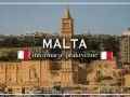 Malta: praktyczne informacje o podróży, w tym o walucie euro. Widok na port z budynkami i kościołem.