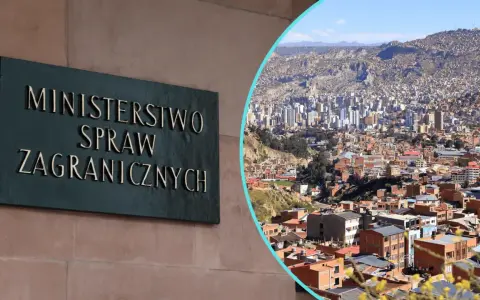 Tablica "Ministerstwo Spraw Zagranicznych" obok panoramy miasta, gdzie nie jechać.