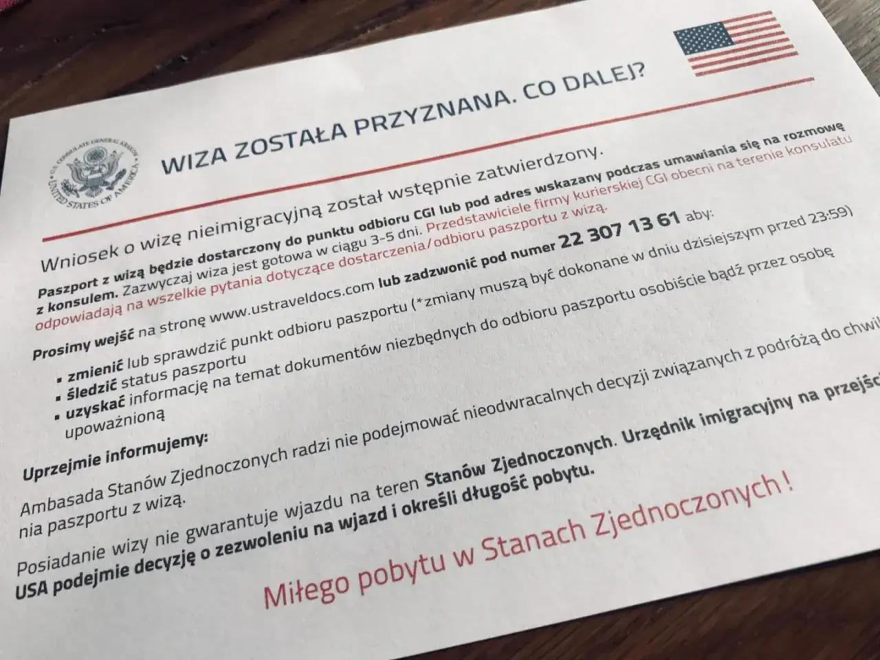 Wiza do USA przyznana! Paszport z wizą odbierzesz wkrótce. Sprawdź status na www.ustraveldocs.com.